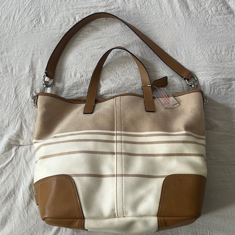 Lightly Used COACH BAG on authentic tan leather and canvas.